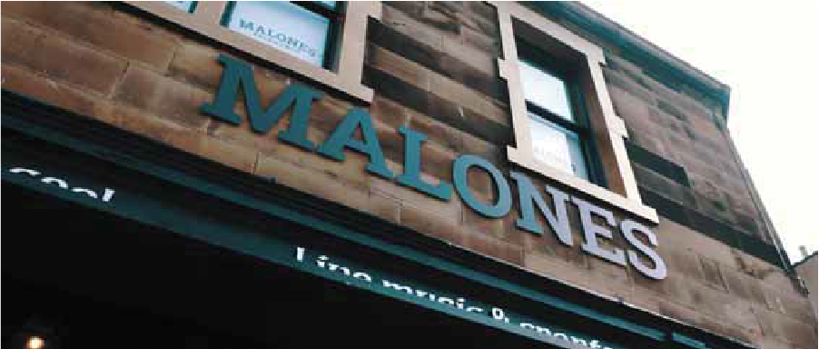 malones-green-signage-on-old-pub-wall-edinburgh new signage edinburgh